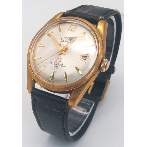 324 - A Rare Garuda Jetmaster Gents Watch. Black leather strap. Gilded stainless steel case - 34mm. Silver... 