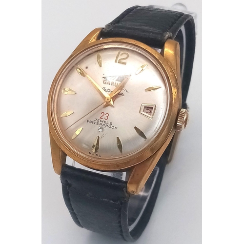 324 - A Rare Garuda Jetmaster Gents Watch. Black leather strap. Gilded stainless steel case - 34mm. Silver... 