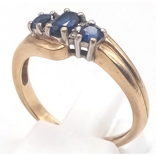 37 - A Vintage 9K Yellow Gold Sapphire and Diamond Ring. Size Q. 3.1g total weight.