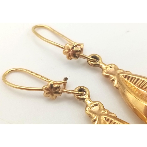 198 - A Pair of Art Deco Style 9K Gold Drop Earrings. 3.5cm. 2.22g total weight.