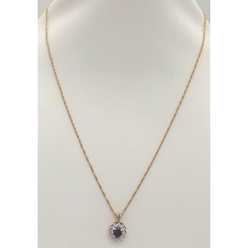 40 - A Sapphire and Diamond Pendant set in 9K Gold on a 9K Yellow Gold Disappearing Necklace. 15mm and 40... 