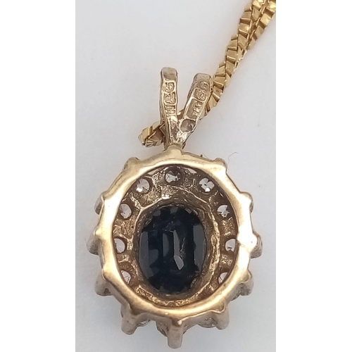 40 - A Sapphire and Diamond Pendant set in 9K Gold on a 9K Yellow Gold Disappearing Necklace. 15mm and 40... 