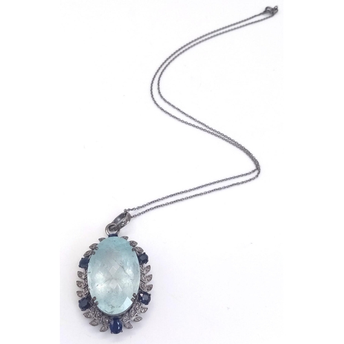 456 - A 36.48ct Aquamarine and Blue Sapphire Gemstone Pendant With Diamond Accents on 925 silver. Comes wi... 