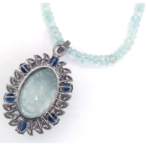 456 - A 36.48ct Aquamarine and Blue Sapphire Gemstone Pendant With Diamond Accents on 925 silver. Comes wi... 