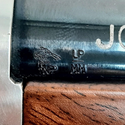 107 - A Deactivated John Wayne Commemorative Winchester Rifle. This model 94, with saddle ring would be fi... 