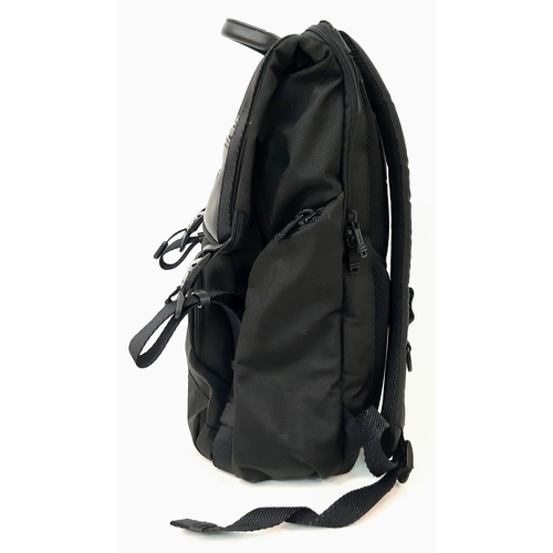 129 - A TUMI Lark Black Backpack, 23L Capacity, Pockets for 16