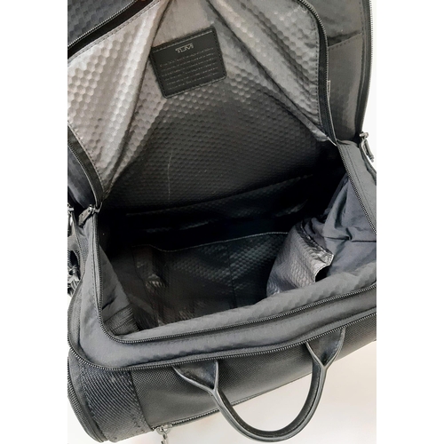 129 - A TUMI Lark Black Backpack, 23L Capacity, Pockets for 16