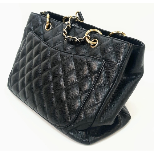 19 - A Chanel Black Quilted Cavier Leather GST Bag, CC Logo on the Front, Black Satin Interior with Gold ... 