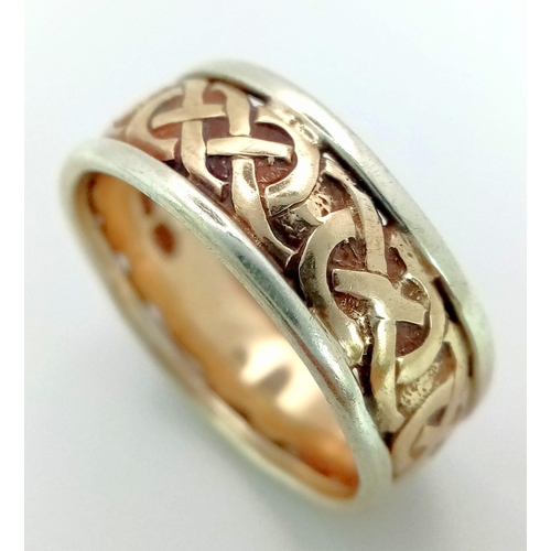 138 - 9K 2 COLOUR CELTIC BAND RING WITH NICE ORNATE DECORATION . TOTAL WEIGHT 5.88G SIZE R.