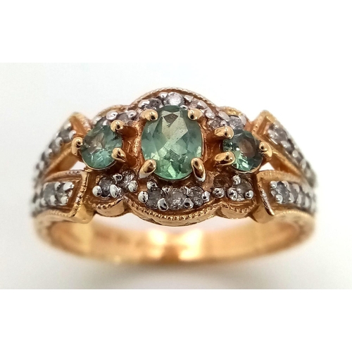 41 - 14K YELLOW GOLD DIAMOND & GREEN TOPAZ FANCY RING. TOTAL WEIGHT 4.3G.  SIZE O