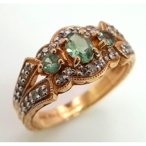 41 - 14K YELLOW GOLD DIAMOND & GREEN TOPAZ FANCY RING. TOTAL WEIGHT 4.3G.  SIZE O