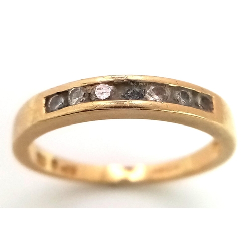 403 - 18K YELLOW GOLD DIAMOND 1/2 ETERNITY RING. TOTAL WEIGHT 2.8G.  SIZE M