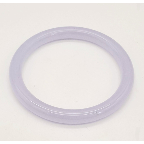 437 - A Beautiful Lavender Jade Thin Bangle. 6cm inner diameter. 
10mm width.