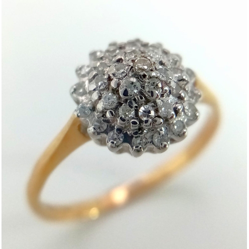 453 - 9K YELLOW GOLD DIAMOND CLUSTER RING.  0.20CT DIAMOND, TOTAL WEIGHT 2G.  SIZE Q