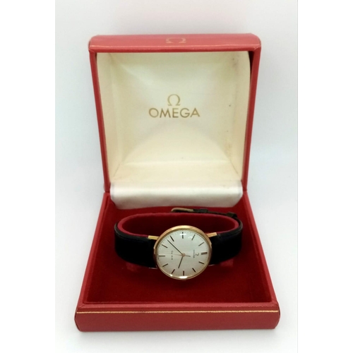 45 - A Beautiful Vintage 9K Gold Omega Geneve Gents Watch. Black leather strap. 9K gold case - 34mm. Whit... 