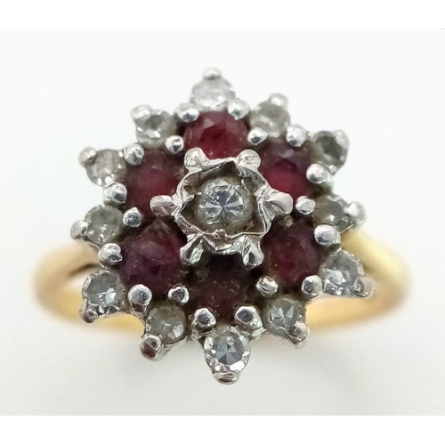 53 - 18K YELLOW GOLD DIAMOND & RUBY CLUSTER RING. TOTAL WEIGHT 3.4G. SIZE K