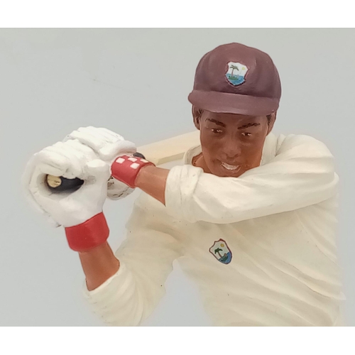 373 - An Endurance Hand Crafted Sir Garry Sobers Cricket Figure. Comes with a COA that has been autographe... 