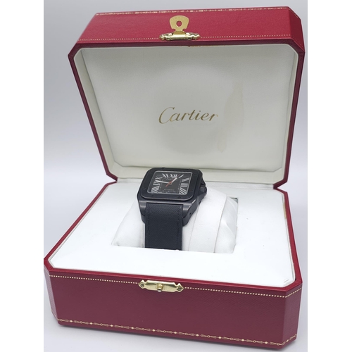 55 - A Stylish Cartier Santos 100 Automatic Gents Watch. Leather and textile strap. Black stainless steel... 