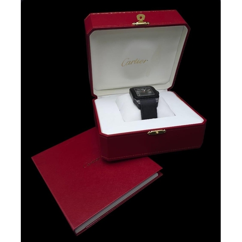 55 - A Stylish Cartier Santos 100 Automatic Gents Watch. Leather and textile strap. Black stainless steel... 