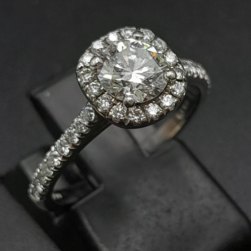 6 - A PLATINUM DIAMOND HALO CLUSTER RING MAIN DIAMOND ROUND WITH BRIILIANT CUT 0.76CT F VS2. EDR CERTIFI... 