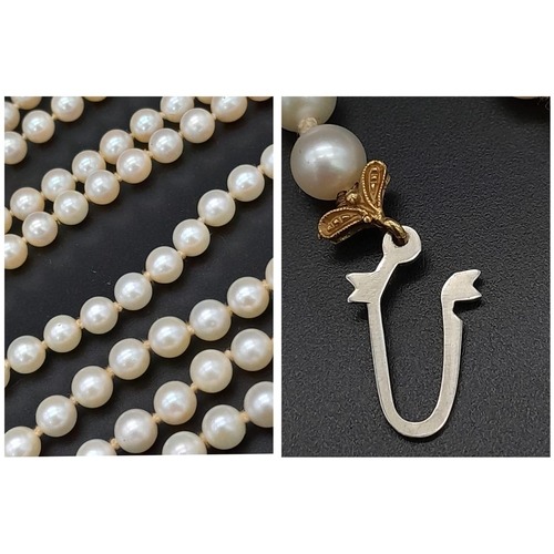 225 - Two Vintage Natural Pearl Necklaces. Both similar in nature with decorative 18k Gold gemstone pendan... 