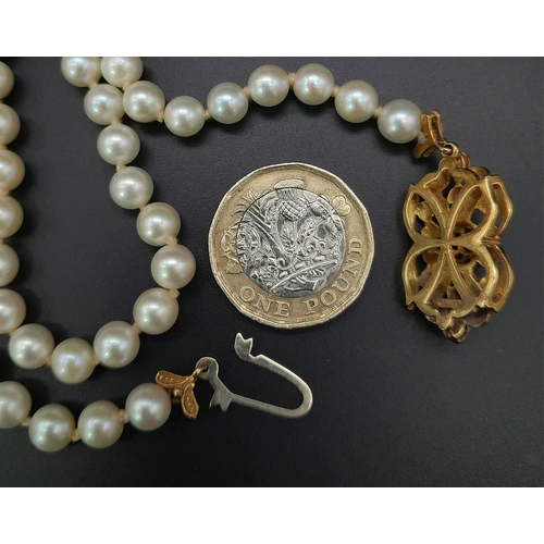 225 - Two Vintage Natural Pearl Necklaces. Both similar in nature with decorative 18k Gold gemstone pendan... 