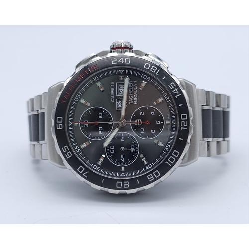 101 - A Tag Heuer Formula 1 Chronograph Gents Watch. Steel and ceramic strap and case - 43mm. Silver tone ... 