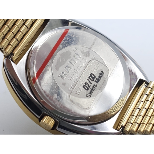 407 - A Gold Plated Rado Diastar Unisex Watch. Gold plated bracelet and case - 36mm. Gold tone dial with d... 