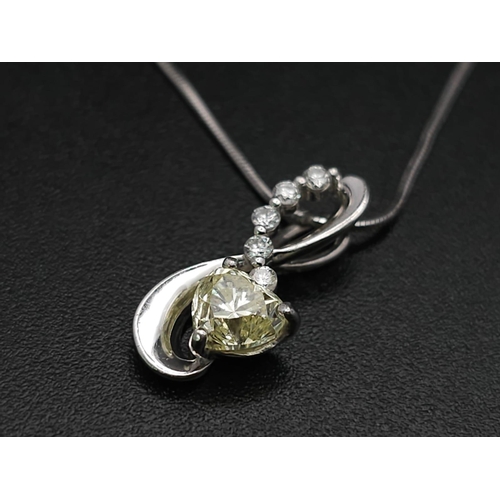 1743 - A Platinum, Diamond And Champagne Diamond Pendant on A Platinum Necklace. Total Weight 3.54g