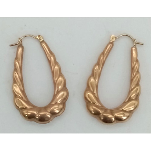 10 - A Vintage Pair of 9K Rose Gold Elongated Hoop Earrings. 3cm. 1.7g total weight.