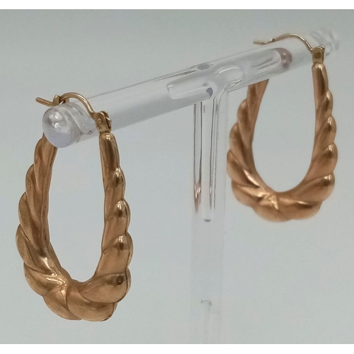 10 - A Vintage Pair of 9K Rose Gold Elongated Hoop Earrings. 3cm. 1.7g total weight.