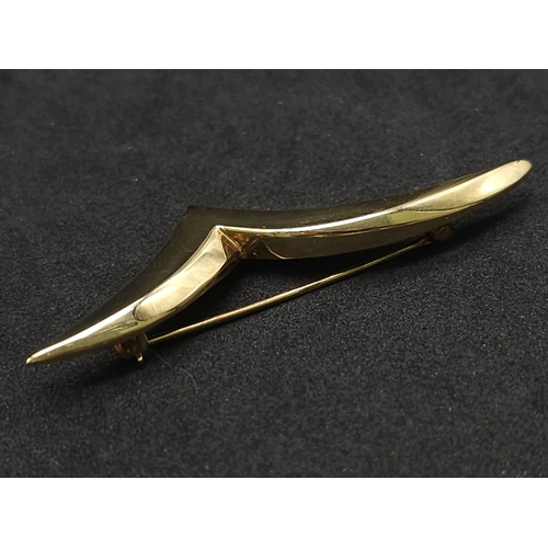 239 - A Tiffany and Co. 18K Yellow Gold Chevron Brooch. 6.6g. 
Comes with a Tiffany box. Ref: 11742