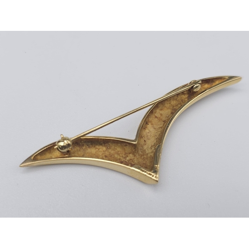 239 - A Tiffany and Co. 18K Yellow Gold Chevron Brooch. 6.6g. 
Comes with a Tiffany box. Ref: 11742