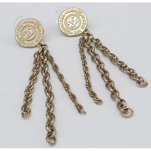 274 - A Pair of Designer Chanel Gilded Drop Earrings. 8cm drop. Comes with Chanel pouch and packaging. Ref... 