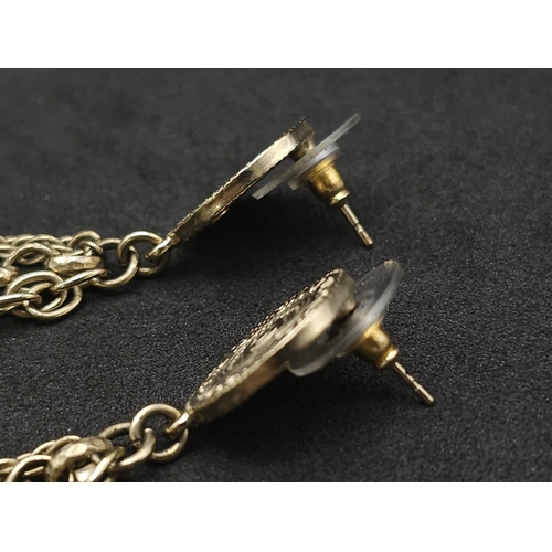 274 - A Pair of Designer Chanel Gilded Drop Earrings. 8cm drop. Comes with Chanel pouch and packaging. Ref... 