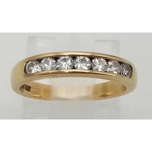 57 - A Vintage 18K Yellow Gold Diamond Half Eternity Ring. Seven round cut diamonds. Size J. 2.8g total w... 