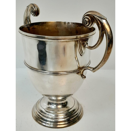 93 - The 925 Sterling Silver Queensway 1977 Golf Trophy. Makers mark of Mappin and Webb. This double-hand... 