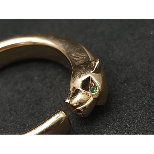 12 - A Cartier 18K Rose Gold Panther Ring with Onyx and Tsavorite Eyes. Size O. 11.1g total weight. Comes... 