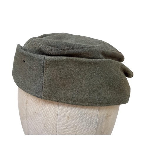 14 - 3 rd Reich Waffen SS M43 Ski Cap. Period related small tear on the top. Overall good condition for i... 