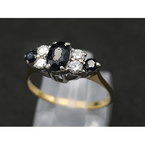 193 - 18K YELLOW GOLD DIAMOND & SAPPHIRE RING.  0.20CT DIAMONDS.  0.40CT OVAL SAPPHIRE. TOTAL WEIGHT 2.4G.... 