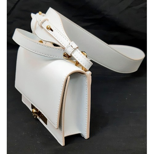 97 - An Alexander McQueen Deep Ivory  Leather Clutch Bag with Gold Skull Detail. Beige Suede Interior, De... 