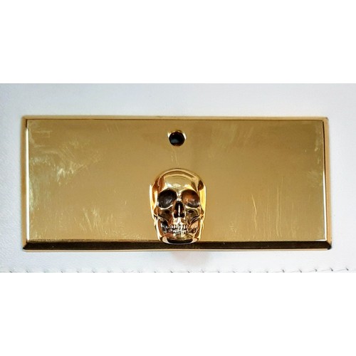 97 - An Alexander McQueen Deep Ivory  Leather Clutch Bag with Gold Skull Detail. Beige Suede Interior, De... 