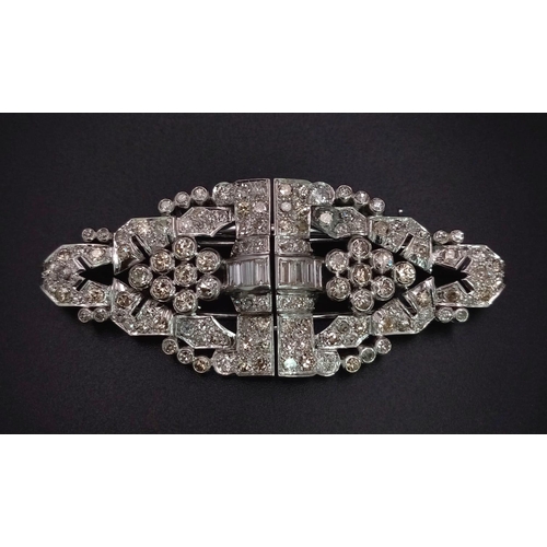 108 - An Art Deco Style 18K White Gold and Diamond Double Clip Brooch. 2ct approx. of round brilliant and ... 