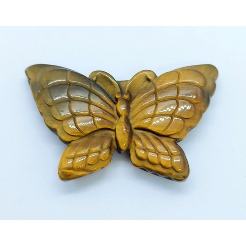 1746 - A Tigers Eye Hand Carved Butterfly Figurine. 5cm wingspan.