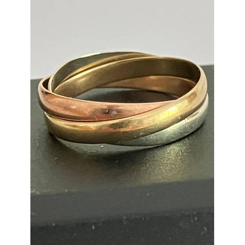 182 - 9 carat GOLD RUSSIAN WEDDING RING, Consisting three different coloured GOLD BANDS. 3.47 grams. Size ... 