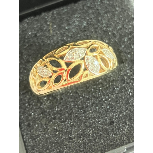 203 - 9 carat YELLOW GOLD RING Having marquise design GOLD openwork set with DIAMONDS to top. Full UK hall... 