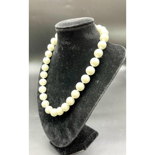 429 - A Bright White South Sea Pearl Shell Large Bead Necklace. Heart clasp. 14mm beads.