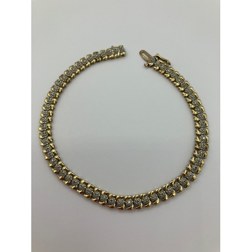 56 - Fabulous 9 carat GOLD and DIAMOND TENNIS BRACELET , Consisting a fully hallmarked gold bracelet set ... 