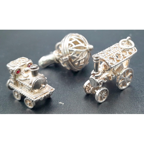 939 - Sterling silver collection of vintage charms, including an opening jug, steam car and train (total w... 
