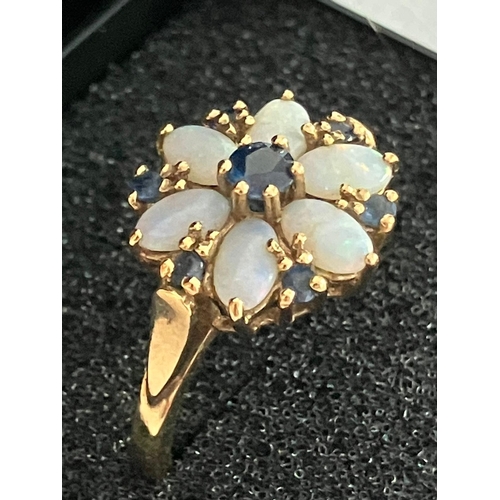 98 - 9 carat YELLOW GOLD RING Having OPALS and SAPPHIRES set to top in attractive GOLD MOUNT. Full UK hal... 